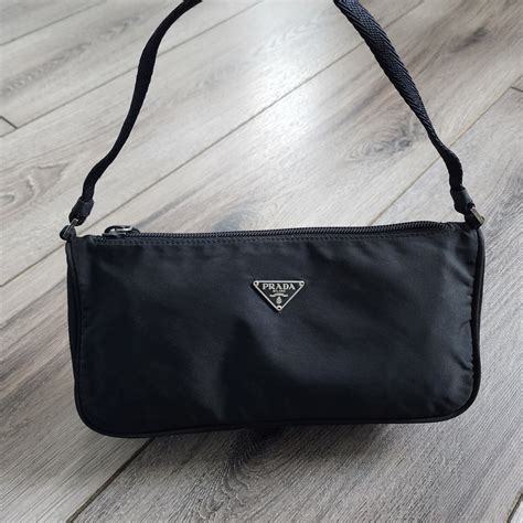 prada candy pochette|prada bag with small pouch.